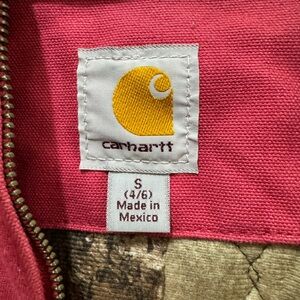 Pink carhartt with camo lining